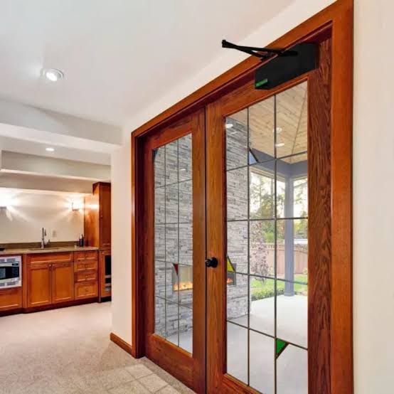 Automatic door opener on a pair of interior French doors